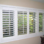 : interior window shutters with fabric inserts